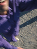 A close-up blurry shot of Hoshi grabbing at the balloon.