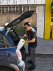 Loading a 55 gallon tank of helium into the trunk of the MINI.