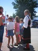 Girl in Nordic dancer garb, with cool braids